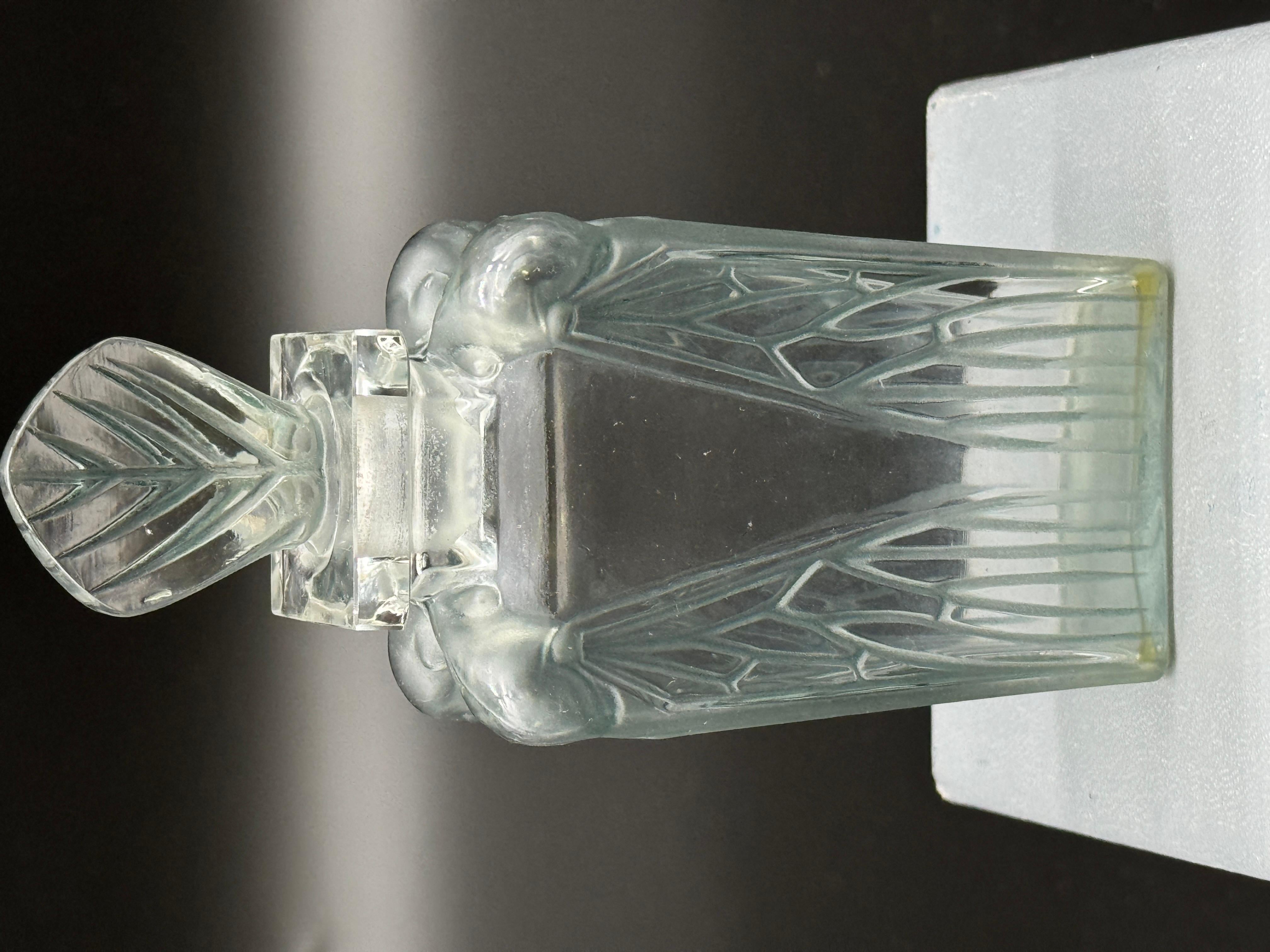 Molded À R.Lalique Perfum
Bottle  Cigalia for the Roger  Gallet Perfums .