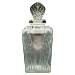 À R.Lalique Perfum
Bottle  Cigalia for the Roger  Gallet Perfums .