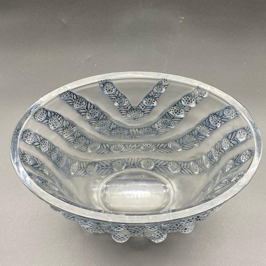 The Vichy vase was made by R.Lalique in 1937 in white glass.

This example is in white and blue / Grey patinated glass.


The vase is signed Lalique in sand blasted letters and is in perfect condition.