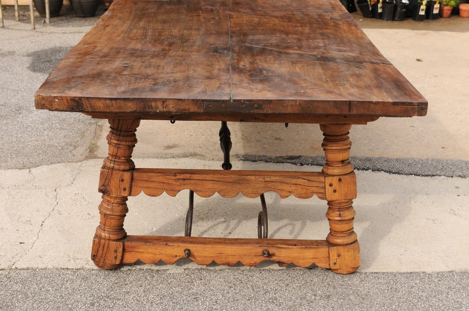 A Robust Italian 9.5 Ft Long Dining Table w/Carved Trestle Legs & Iron Stretcher For Sale 5