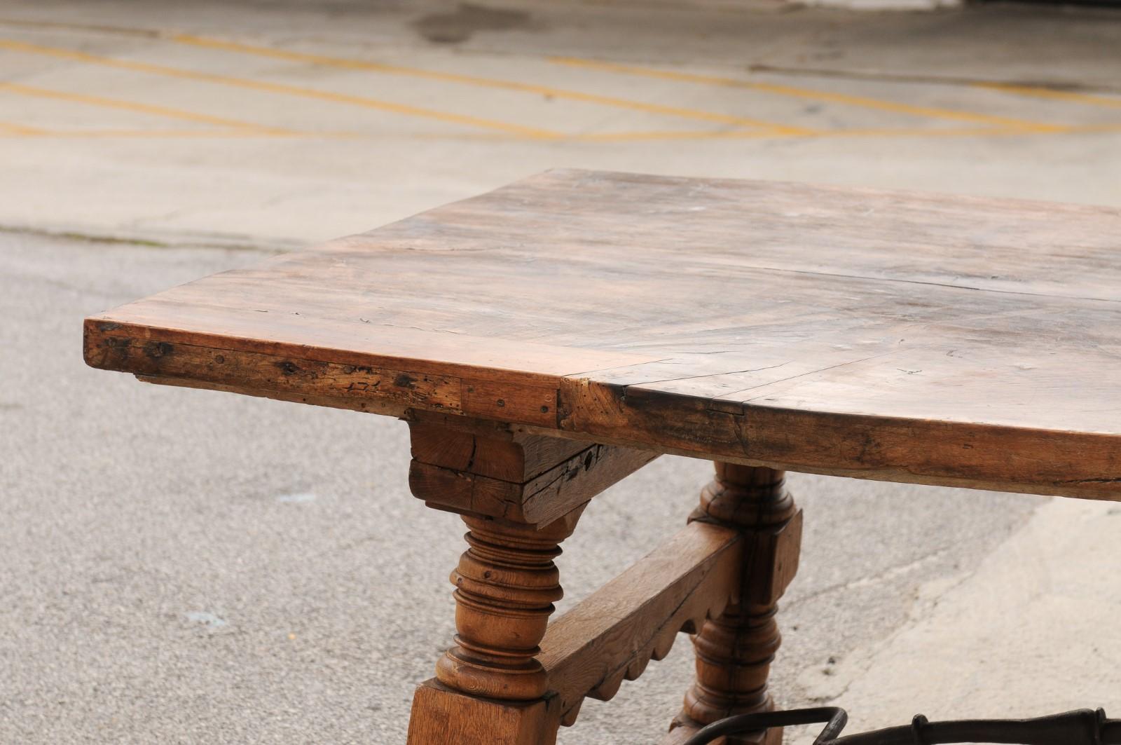 A Robust Italian 9.5 Ft Long Dining Table w/Carved Trestle Legs & Iron Stretcher For Sale 7