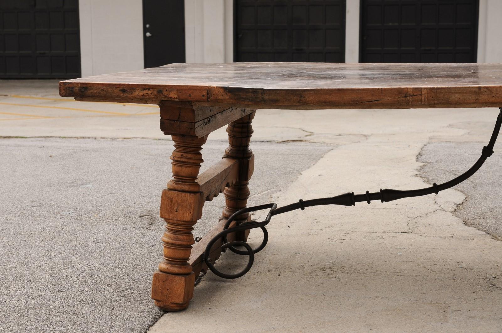 A Robust Italian 9.5 Ft Long Dining Table w/Carved Trestle Legs & Iron Stretcher For Sale 8
