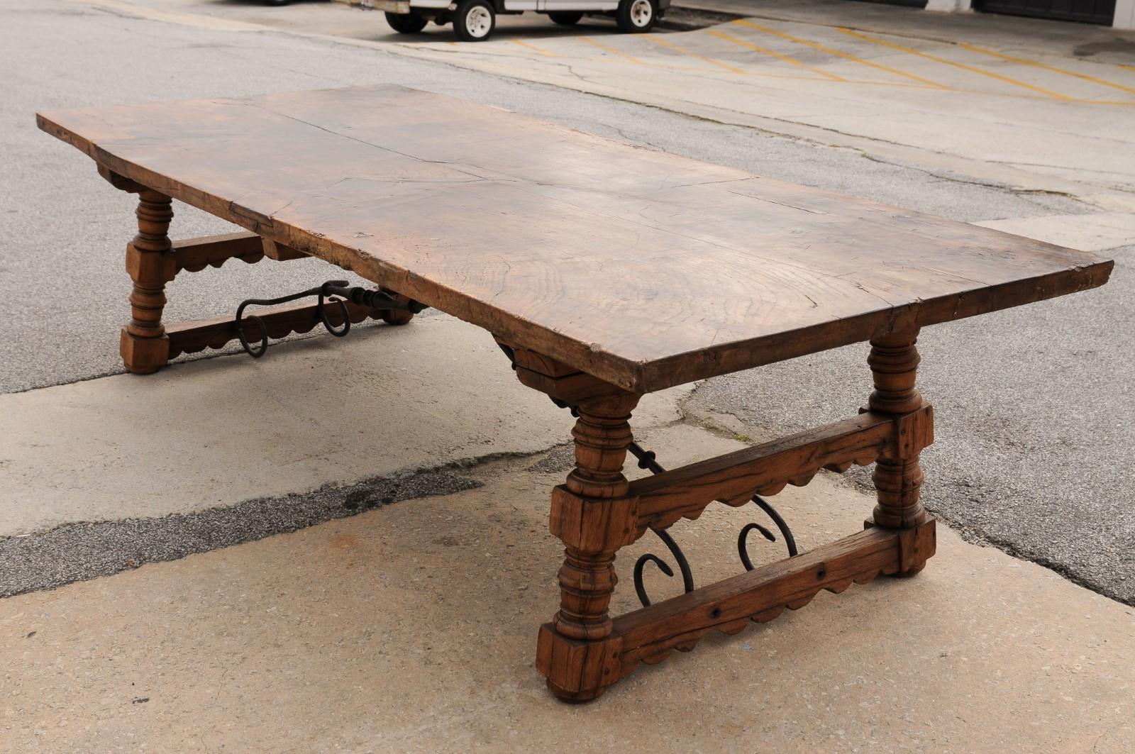 A Robust Italian 9.5 Ft Long Dining Table w/Carved Trestle Legs & Iron Stretcher For Sale 4