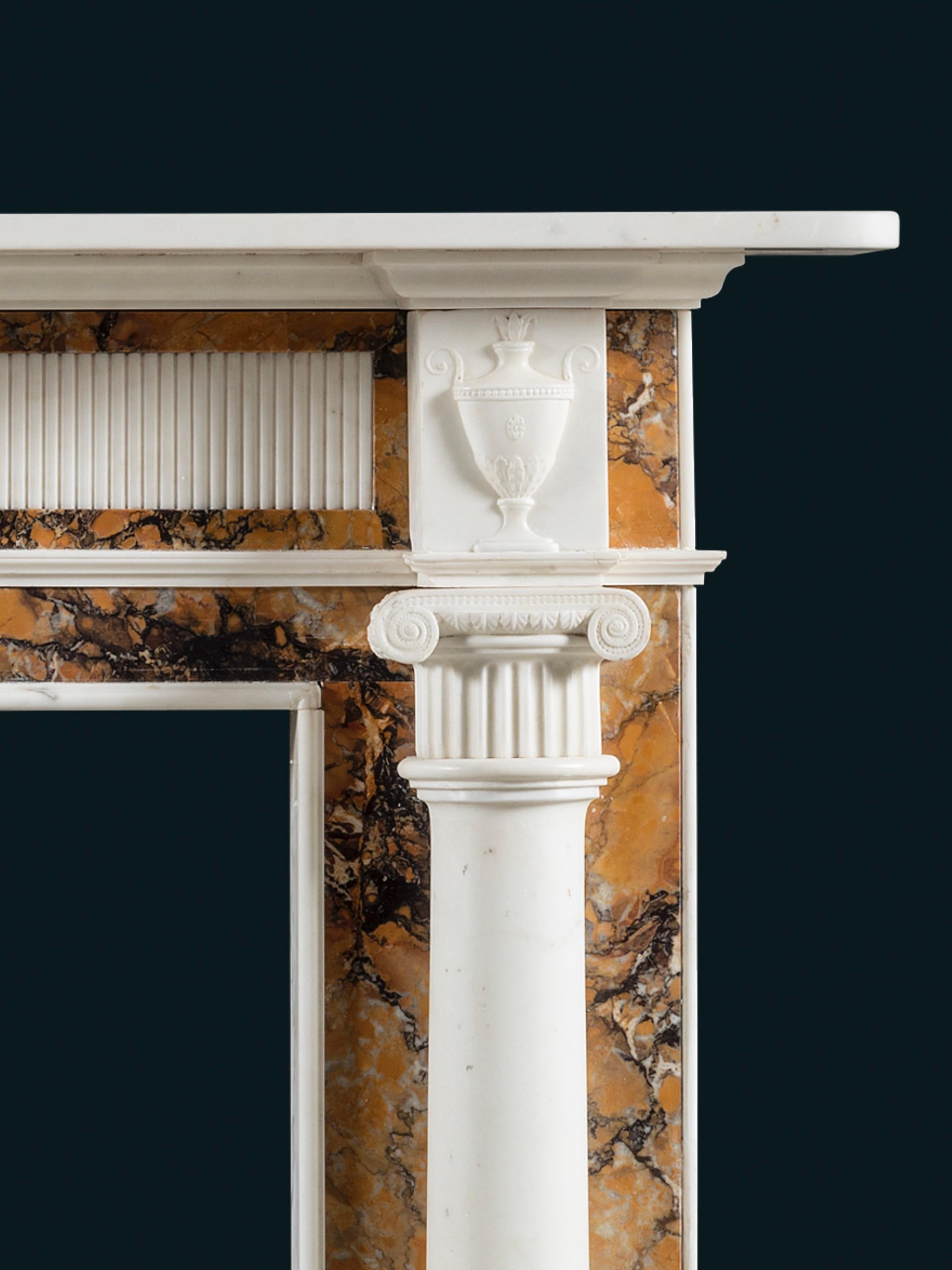 A Robust Regency Chimneypiece in Statuary and Convent Sienna Marbles In Good Condition For Sale In London, GB