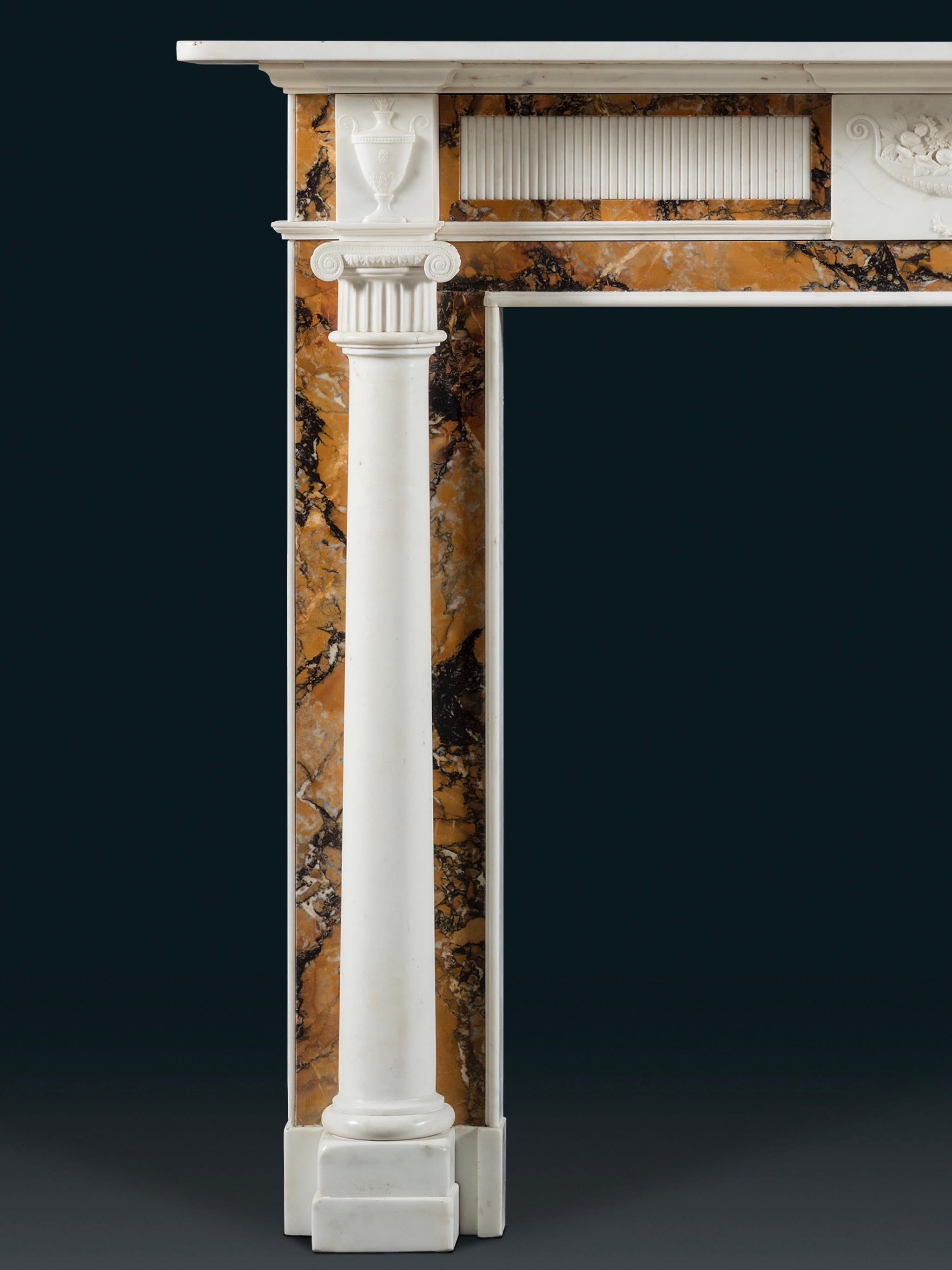 Early 19th Century A Robust Regency Chimneypiece in Statuary and Convent Sienna Marbles For Sale