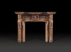 A Robustly Carved George II Style Pine Chimneypiece of Impressive Scale