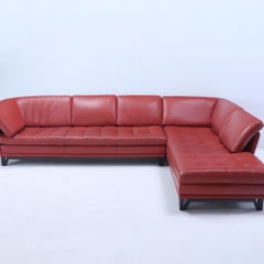 A Roche Bobois Cinnamon Brown Leather Sectional Sofa designed by Philippe Bouix.