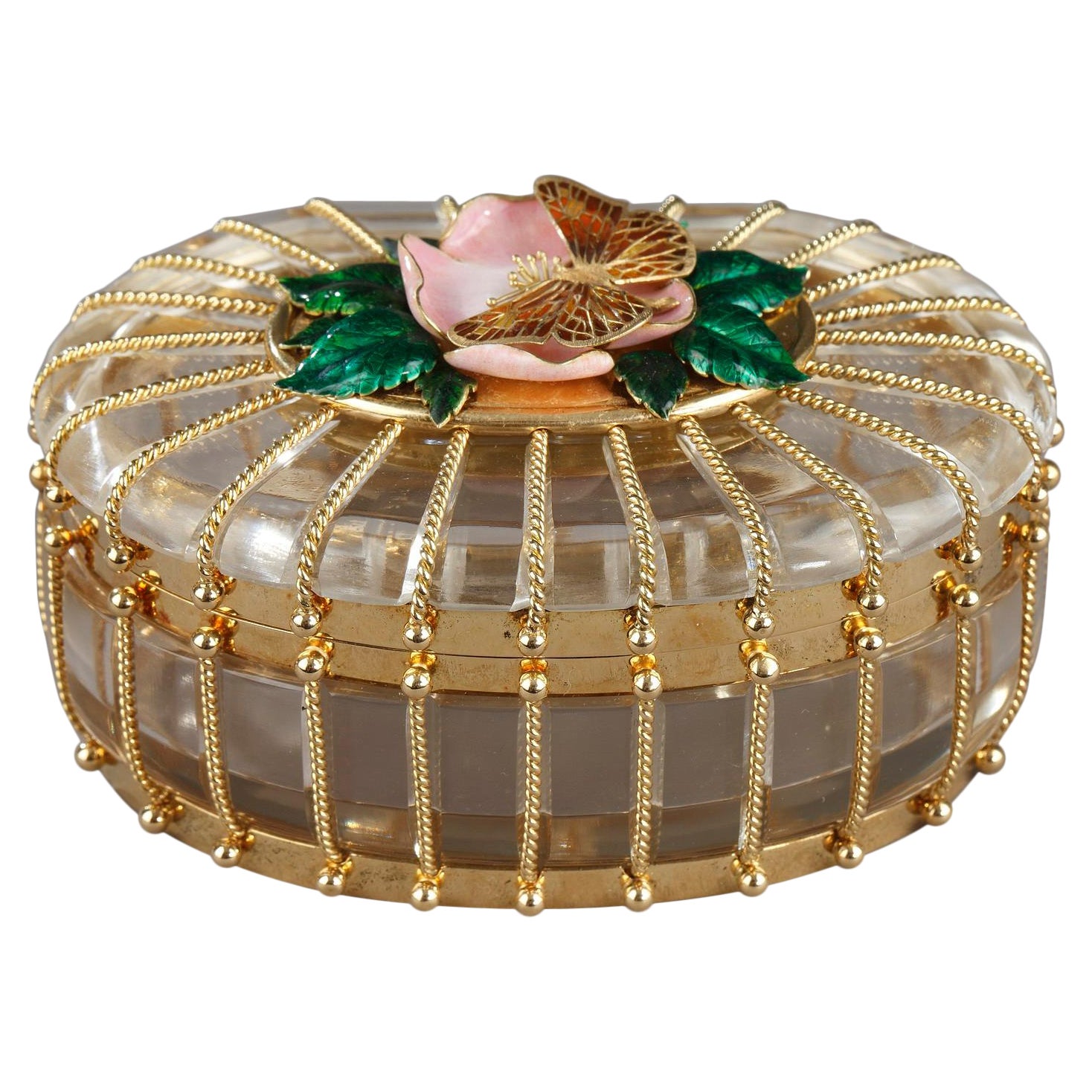 A Rock Crystal Box with Enamelled Gold mounts, Algernon Asprey LTD, Sheffield.