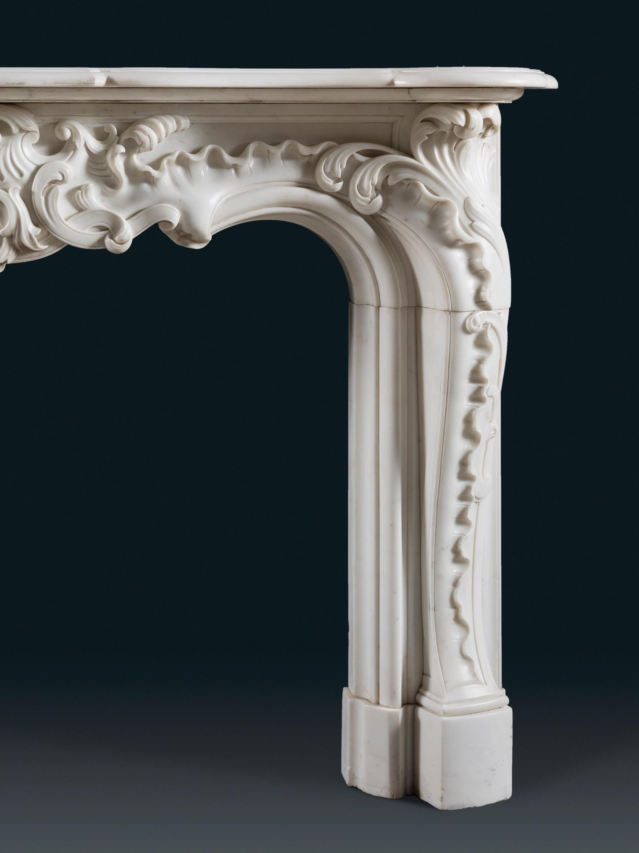French A Rococo Chimneypiece of Character & Scale in White Statuary Marble For Sale