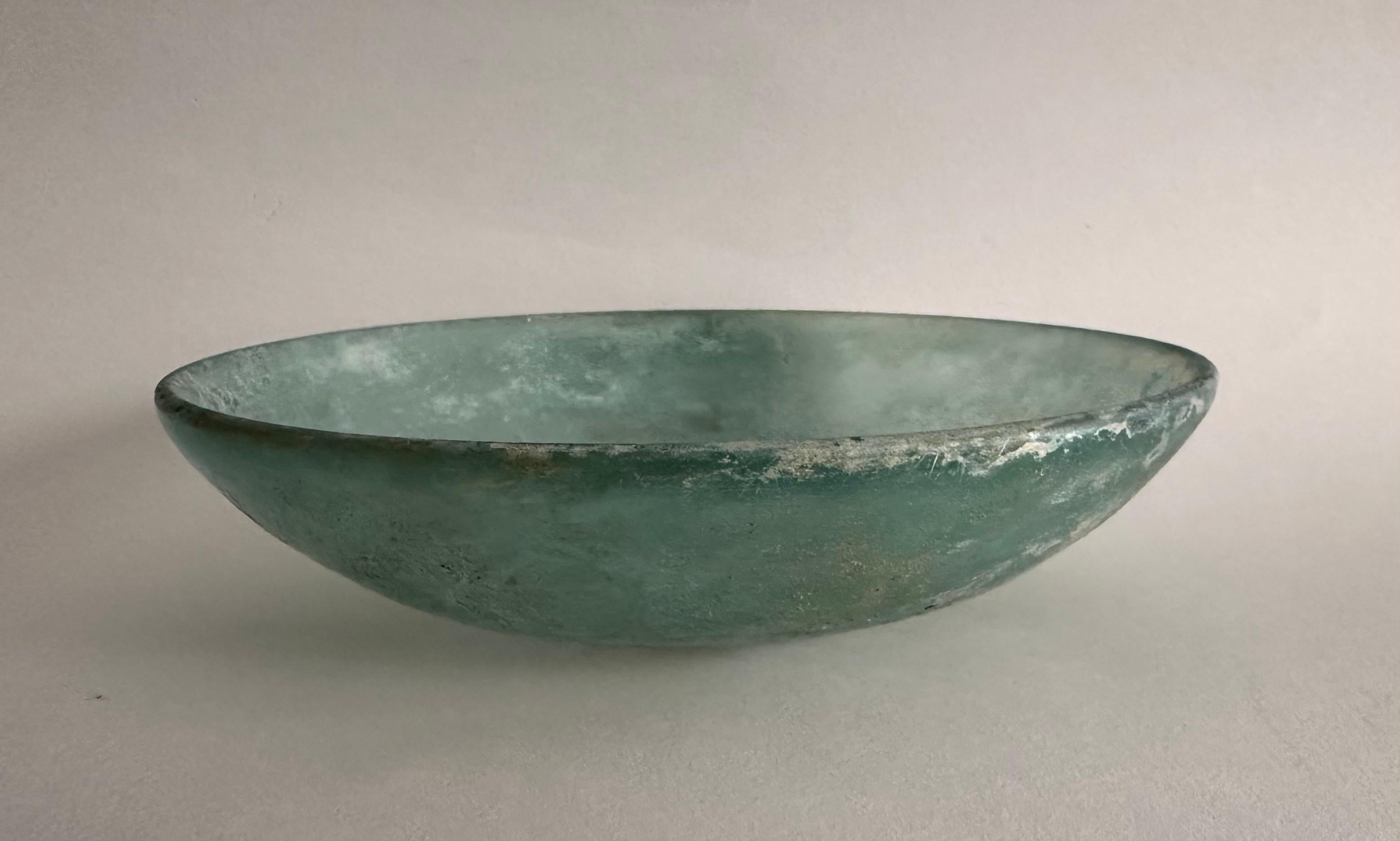 A Roman Blue Glass Bowl, Hellenistic Period, 1st Century B.C. For Sale 1
