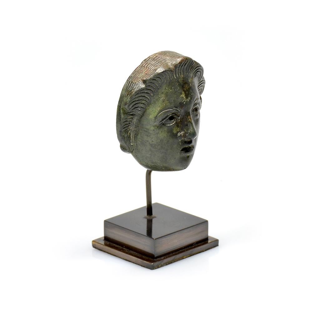 A Roman bronze head attachment of a youth For Sale 1