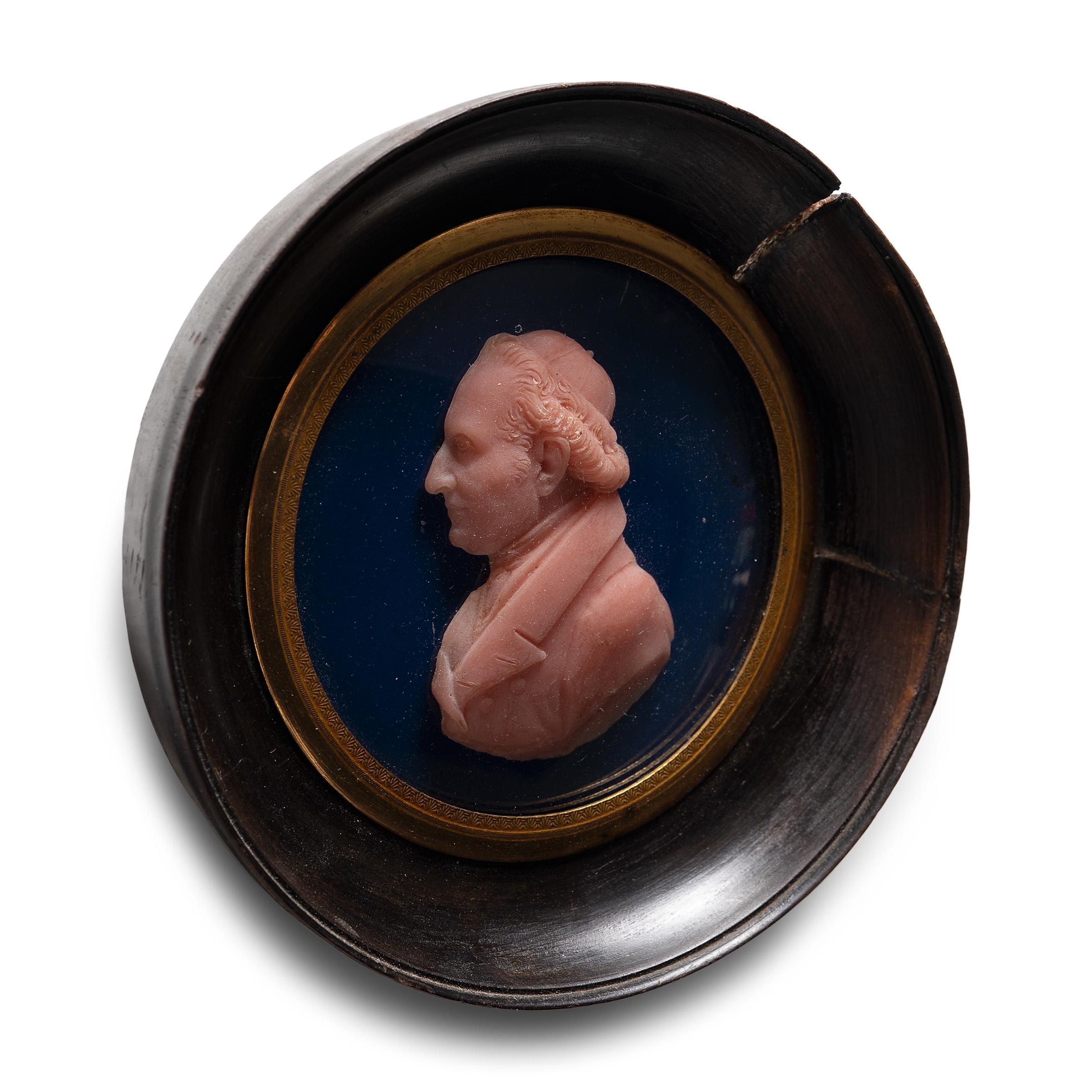 This is a beautiful example of the wax modeling work of 17th century Italian sculptor and painter, Francesco Pozzi. Made with stunning attention to detail, wax is one of the earliest known mediums for portraiture. Miniature wax portraits were first