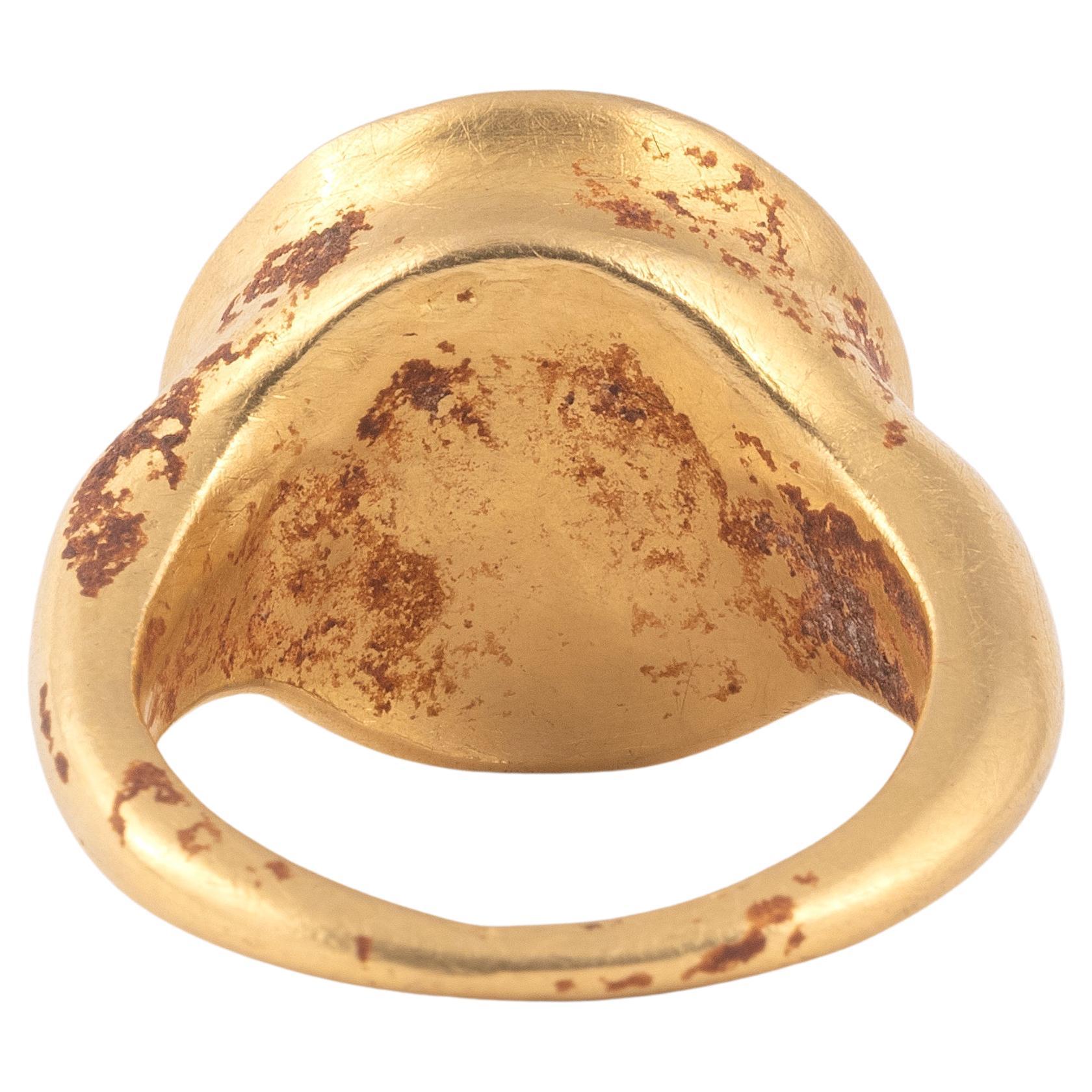 A large hollow gold ring with a cameo of a boy shown three quarters facing towards the right. Some have suggested that these are portraits of the young Caracalla. It might be difficult to argue this other than for the determination of Septimius