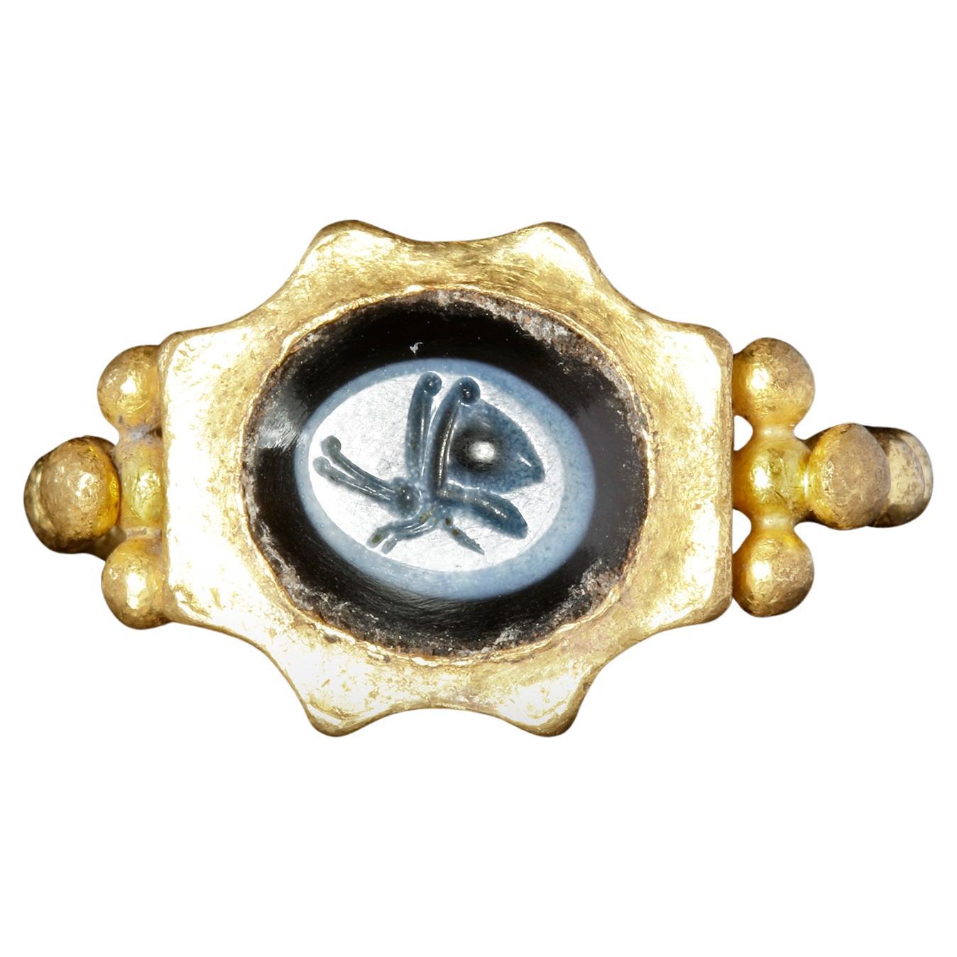 Anillo romano calcográfico de oro amarillo de 22 quilates con mariposa de Nicolo Siglo II d.C. en Bueno estado para la venta en Firenze, IT