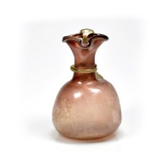 A Roman purple glass jug