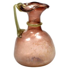 Used A Roman purple glass jug