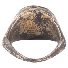 A Roman Silver Gilt Ring With A Chalcedony Athene Intaglio  1st-2nd Century A.D.