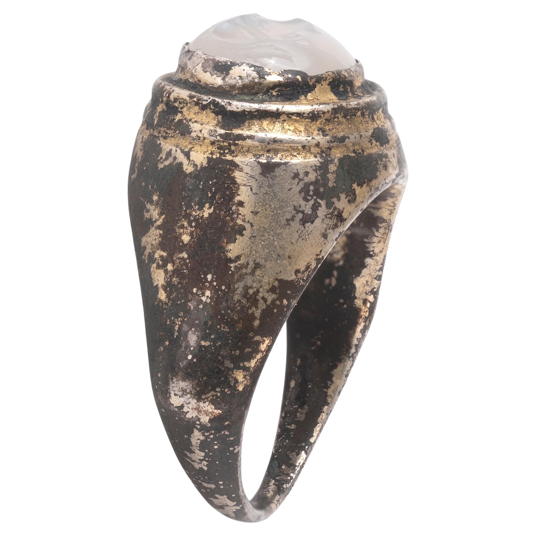 Classical Roman A Roman Silver Gilt Ring With A Chalcedony Athene Intaglio  1st-2nd Century A.D. For Sale