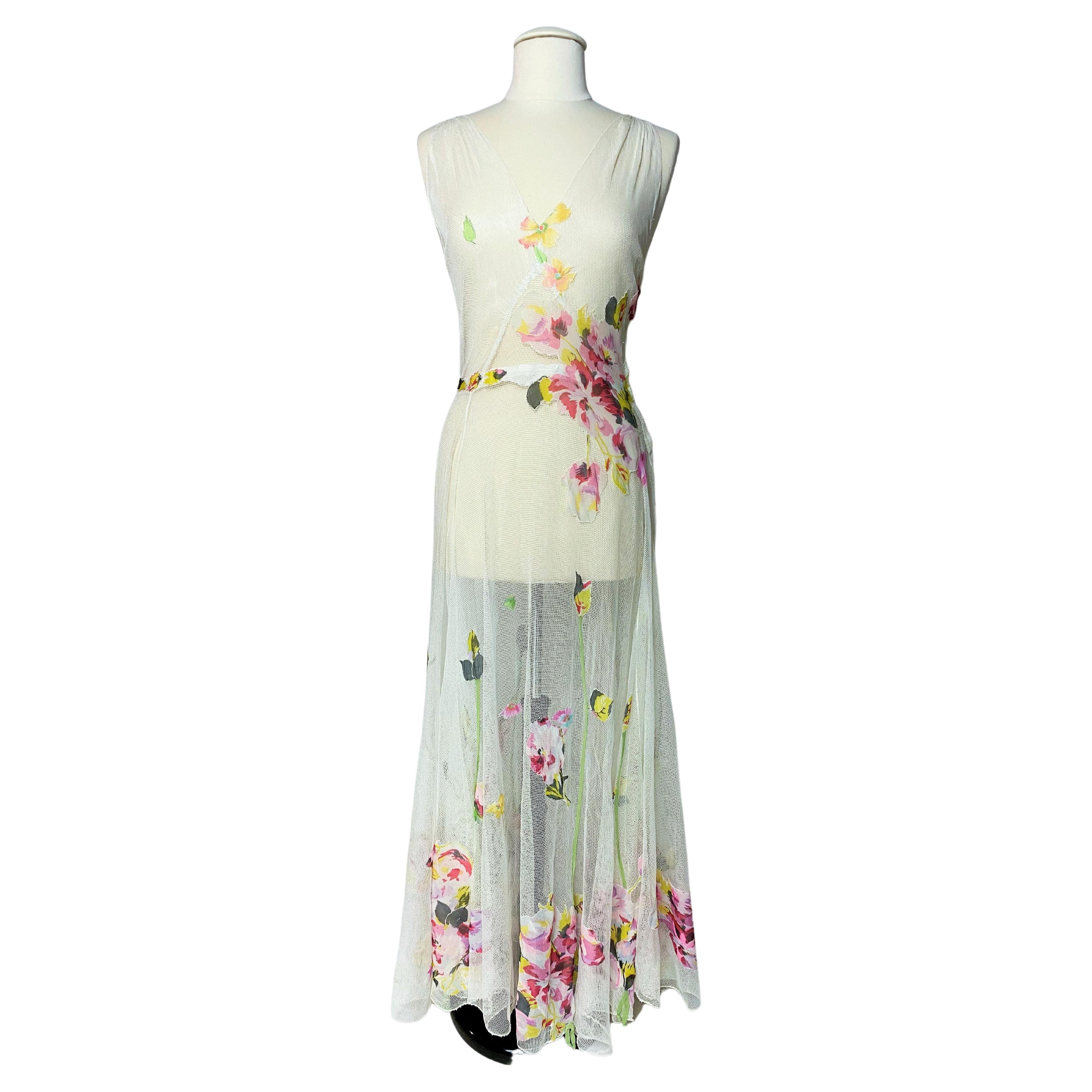 A Romantic Dress in white cotton Net applied with printed Chiffon Circa 1938 For Sale