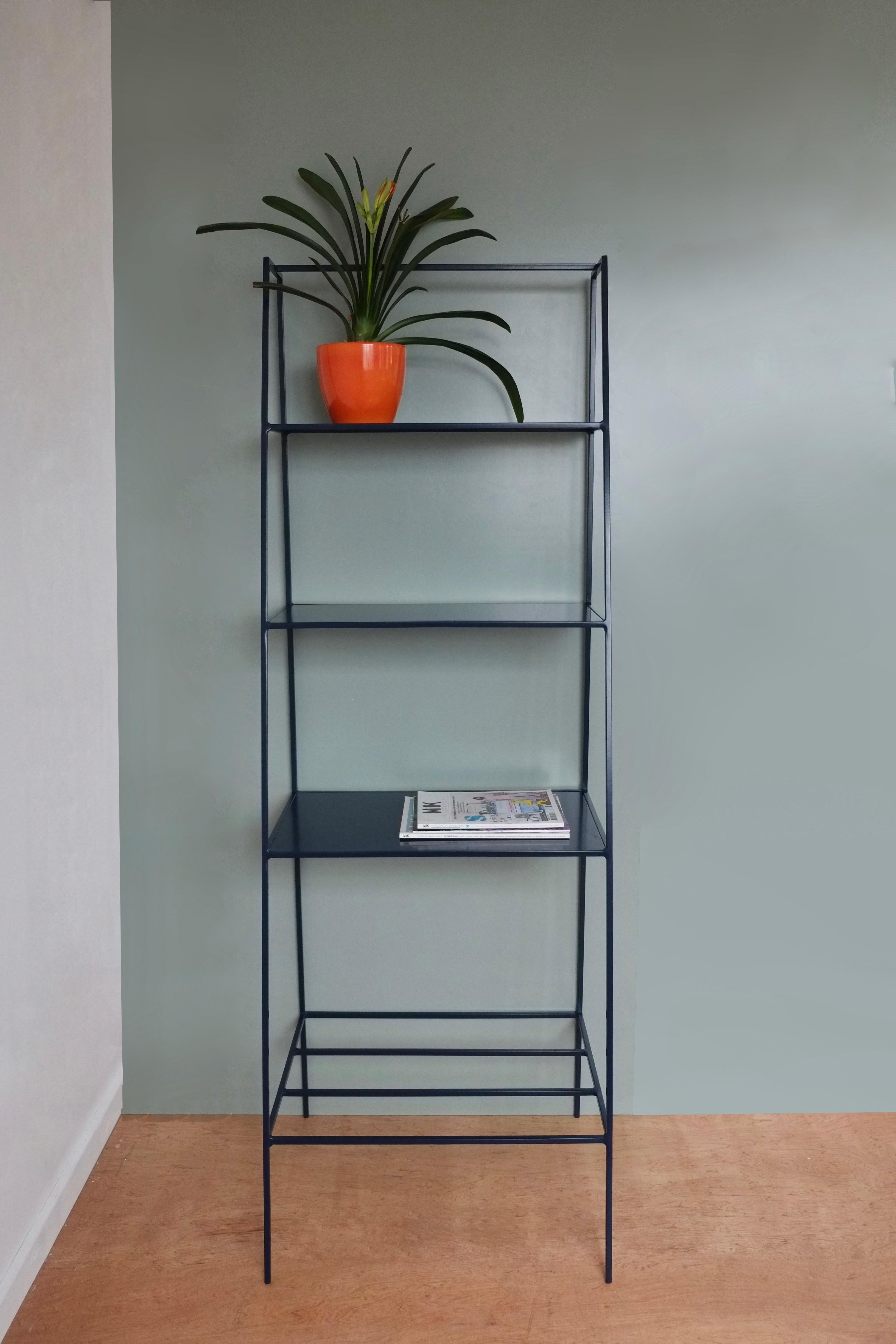 Modern freestanding shelves unit for books and plants. The shelves are designed to look delicate and airy but strong. The straight back design sits neatly against a wall or can be free standing to create a room division. The clean lines look great