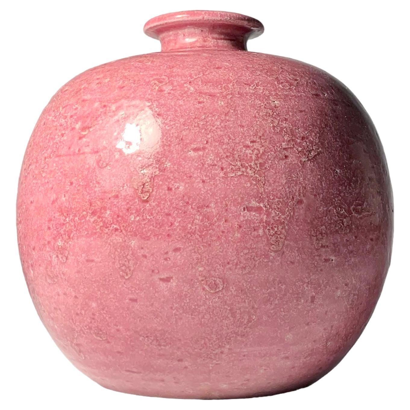Un vase en céramique Bitossi rose d'Aldo Londi