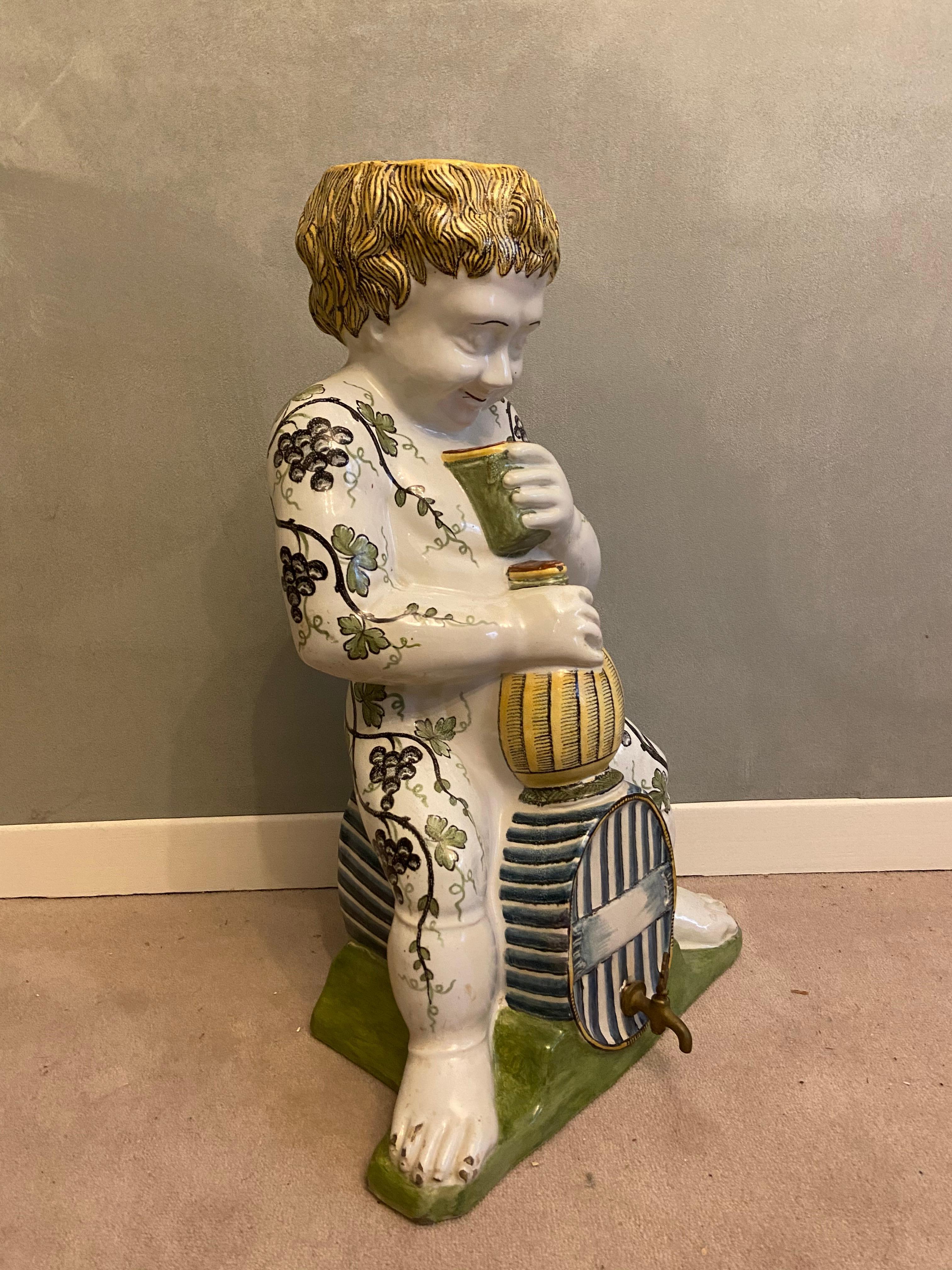 Earthenware Rouen Faience in the Shape of a Young Bacchus, 18th Century For Sale