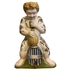 Antique Rouen Faience in the Shape of a Young Bacchus, 18th Century