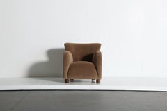A Round Arm Lounge Chair, Upholstered in Pure Alpaca