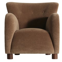 A Round Arm Lounge Chair, Upholstered in Pure Alpaca