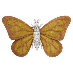 A Round Brilliant Diamond And Three Colour Gold Butterfly Brooch Circa 1960s