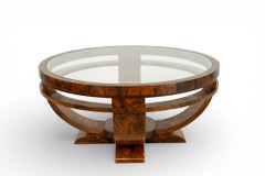 A Round Coffee Table with Glass Top