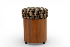 A Round Stool with Upholstered Top