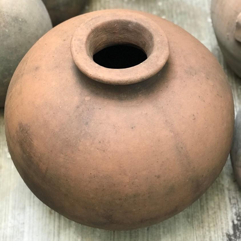 Benito is a vintage terracotta vessel discovered in a potters studio in the region of Jalisco, Mexico. This vessel references a pottery style typical of Oaxacan region. The aged terracotta provides an elegant patina. This piece can used as a garden