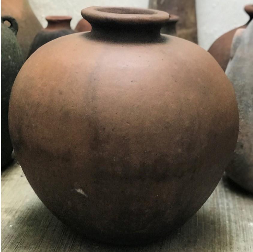 round terracotta vase
