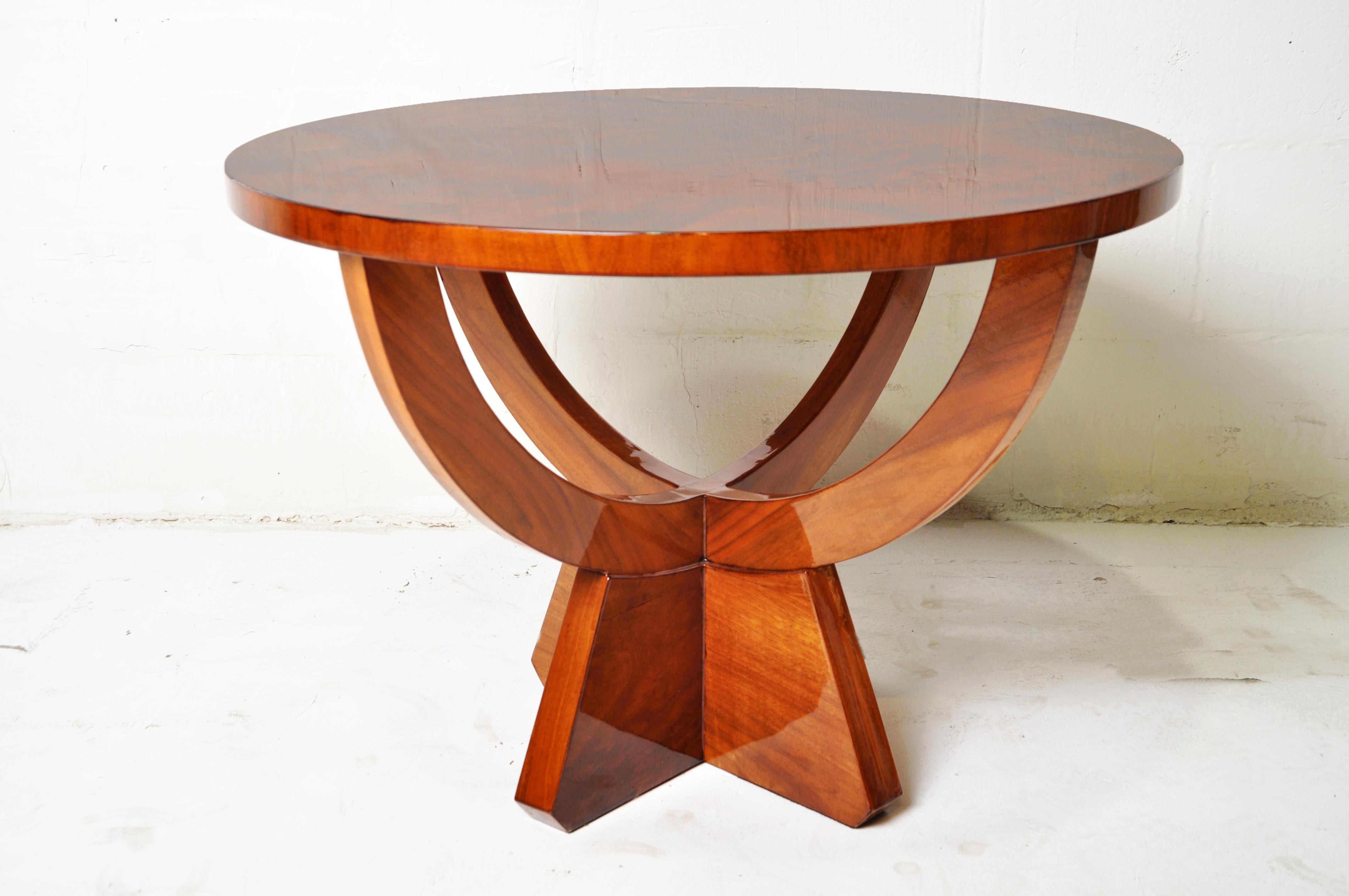 A Round Walnut Veneer Table  1