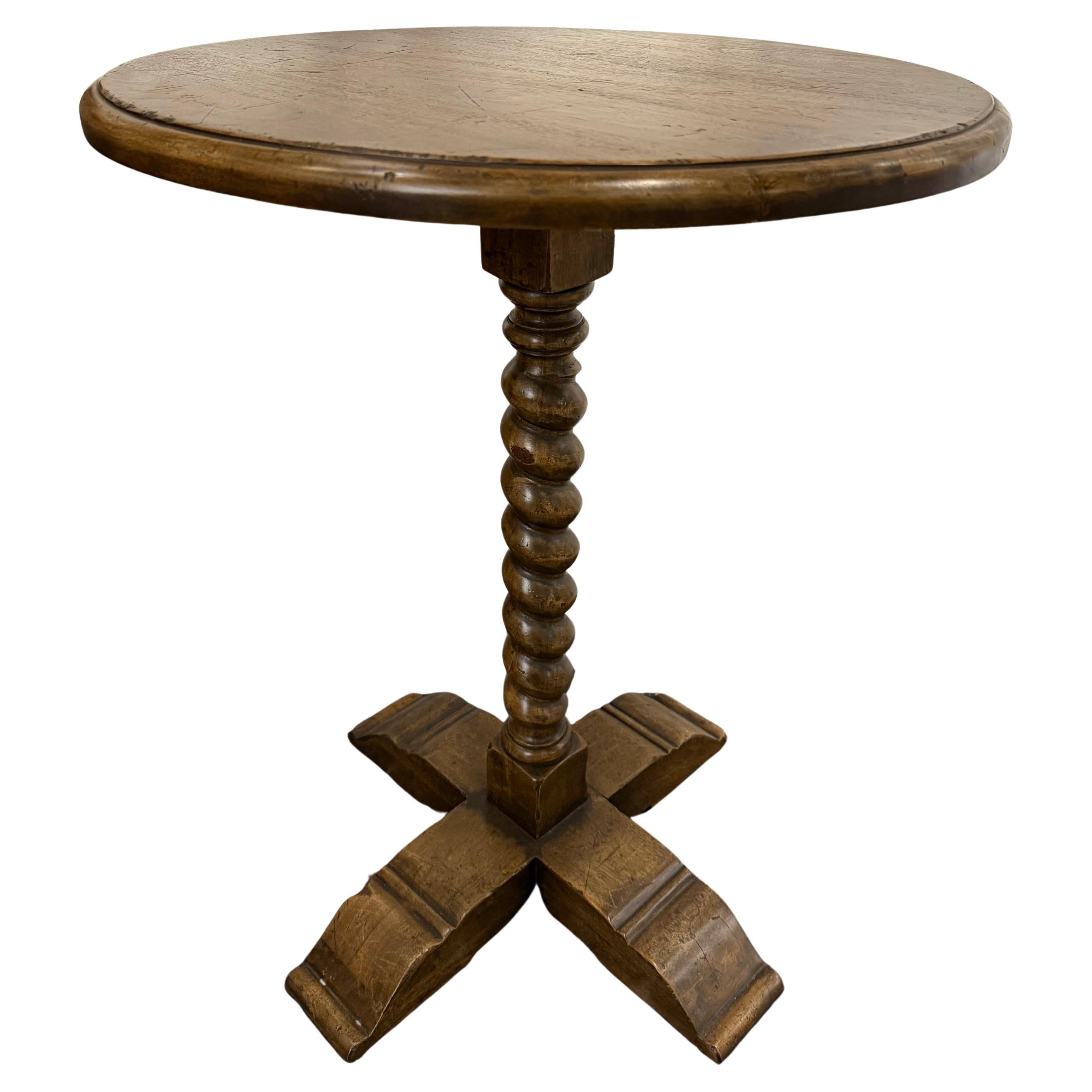 A Round Wooden Occassional Table with Barley Twist Pedestal