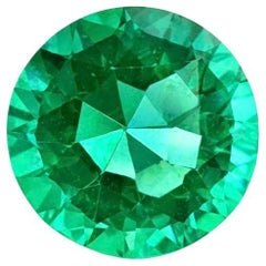 A Round Zambian Emerald of 0.59-Carat