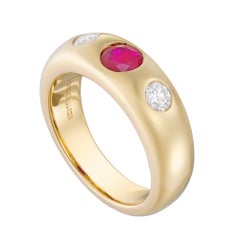 A ruby and diamond gypsy ring