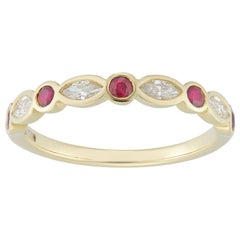 A Ruby and Diamond Half Eternity Ring