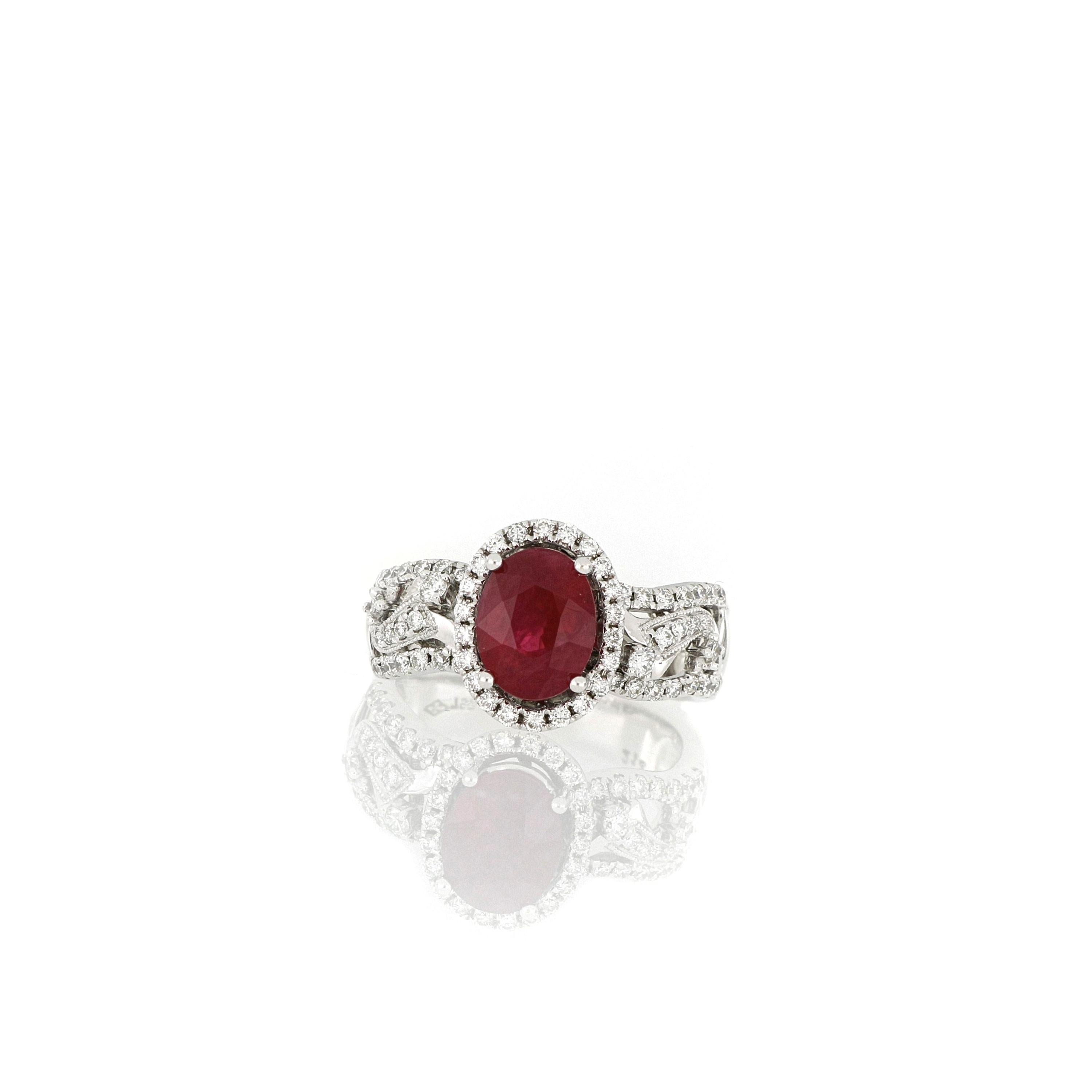 A fabulous ring, set with a natural oval brilliant cut ruby of bright red colour weighing 2.12cts, sourced in Burma, decorated with brilliant cut diamonds extending to the shoulders totaling 0.53cts, mounted in 18 karat white gold.
O’Che 1867 is