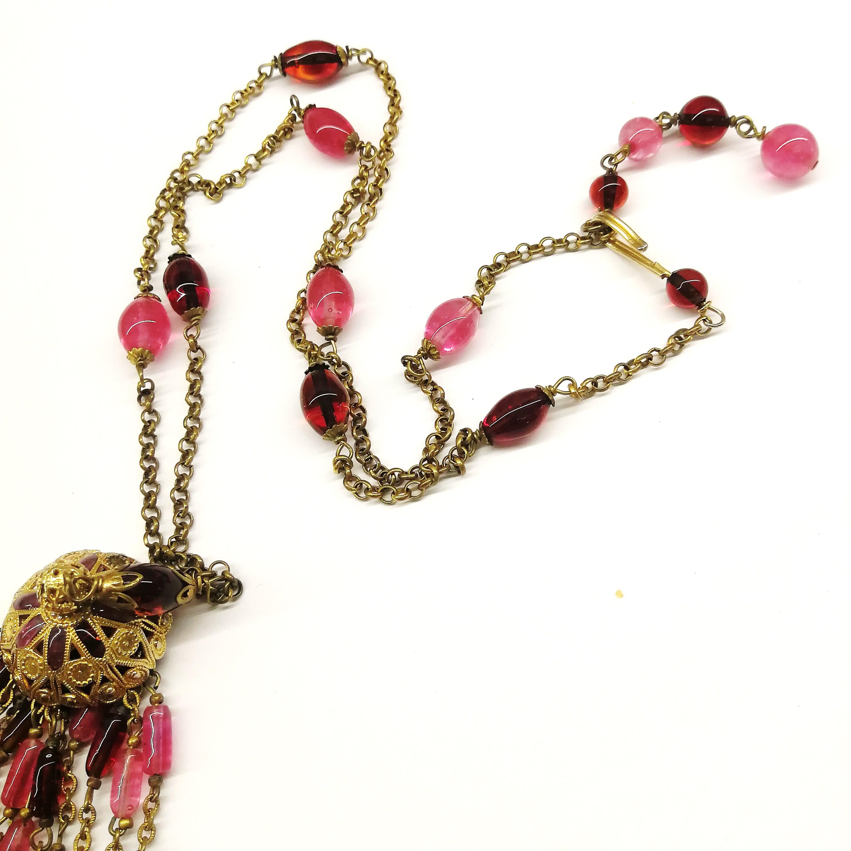 A ruby poured glass and gilt chain 'tassel' sautoir, Maison Gripoix, 1960s 6
