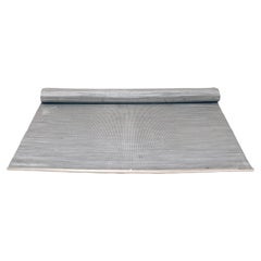 Antique A rug made of woven steel wire, from a conveyor belt, USA early 20th century.