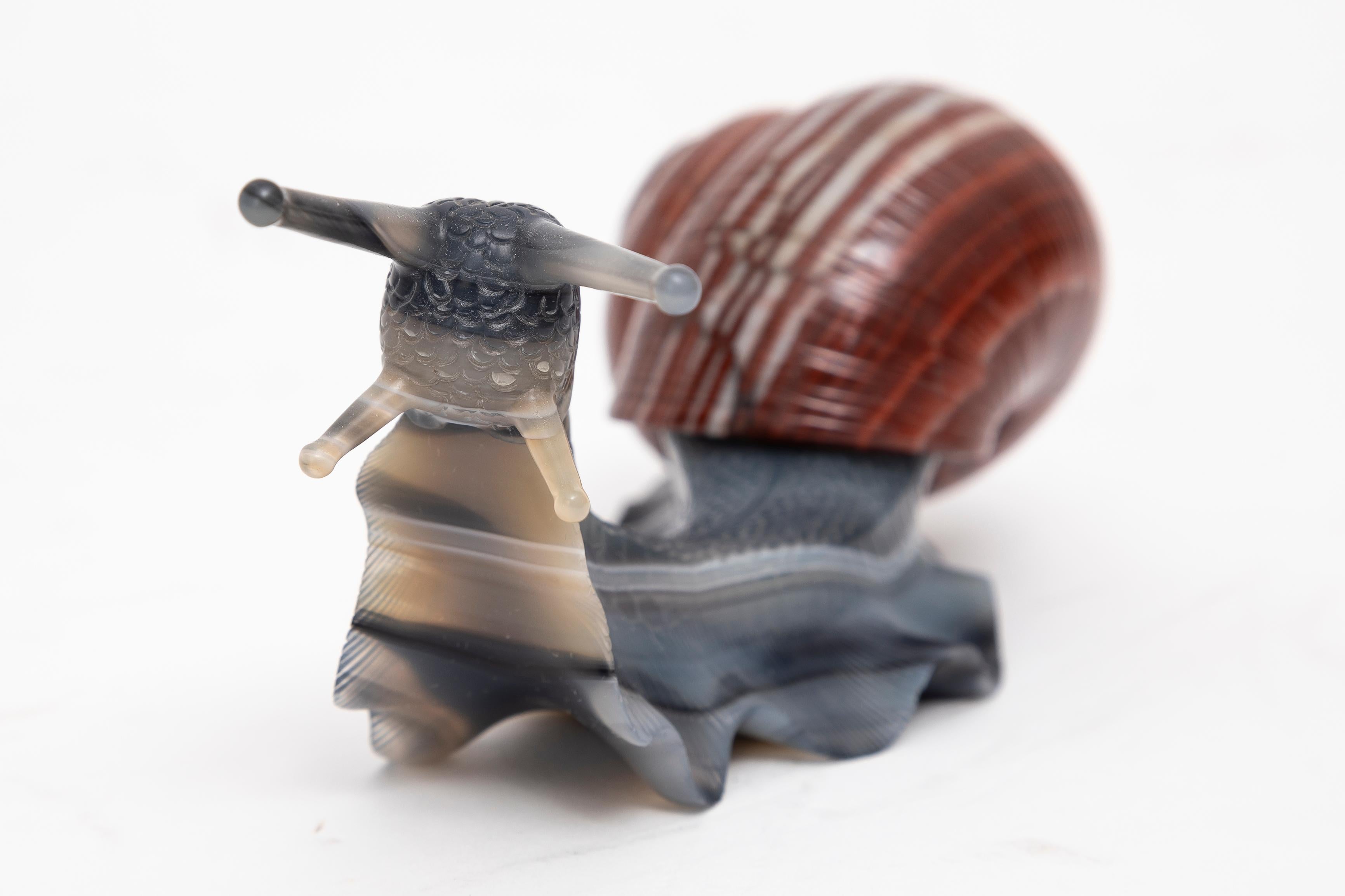 A Gorgeous 19th Century Russian Hand-Carved and Hand-Polished Banded Agate Figure of a Snail, Attributed to Faberge. This snail is an extraordinary example of Russian lapidary craftsmanship. It showcases a very naturalistic and lifelike