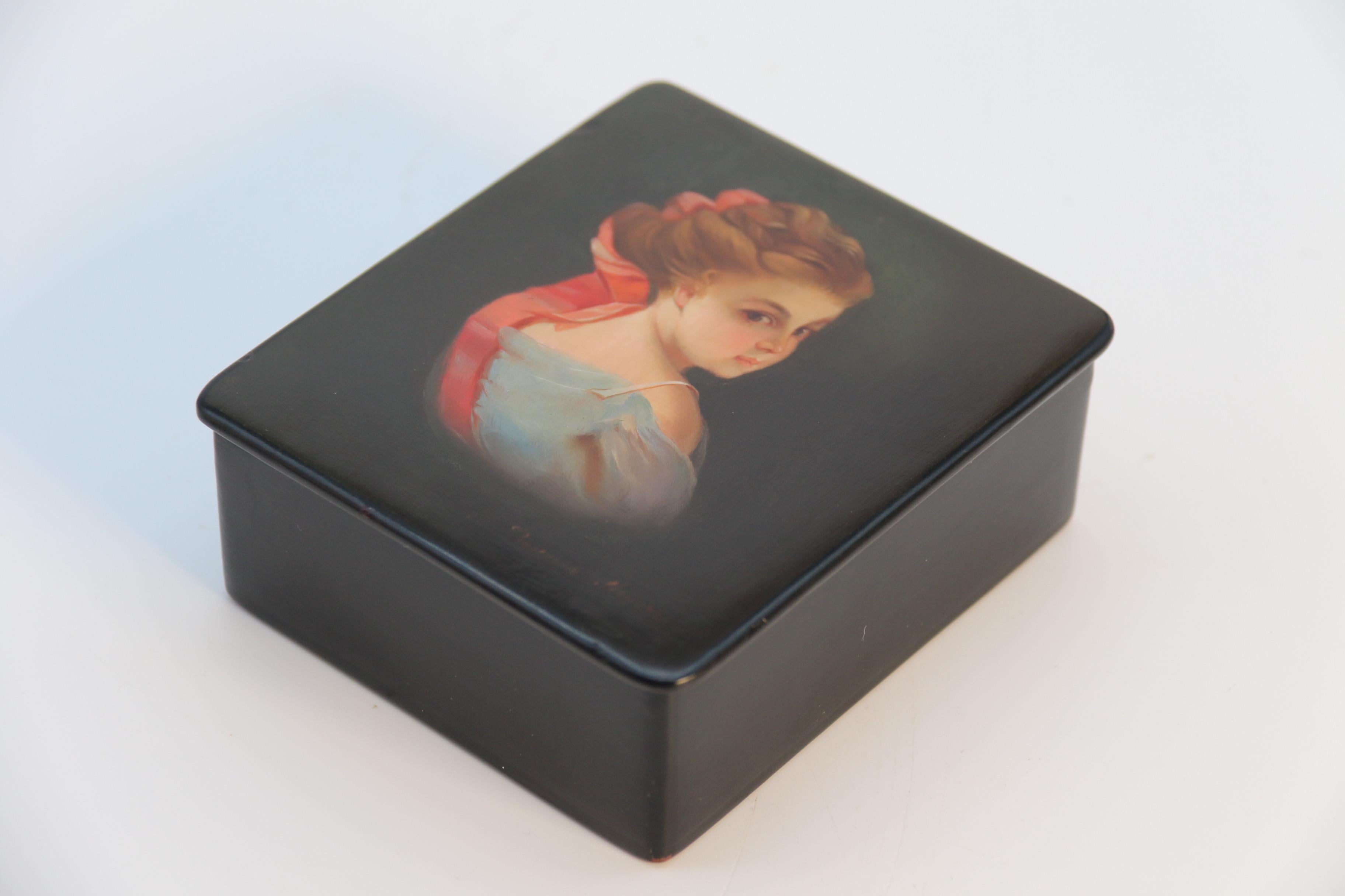 Lacquered A Russian lacquered box with a portrait of a beautiful young woman circa 1920 For Sale