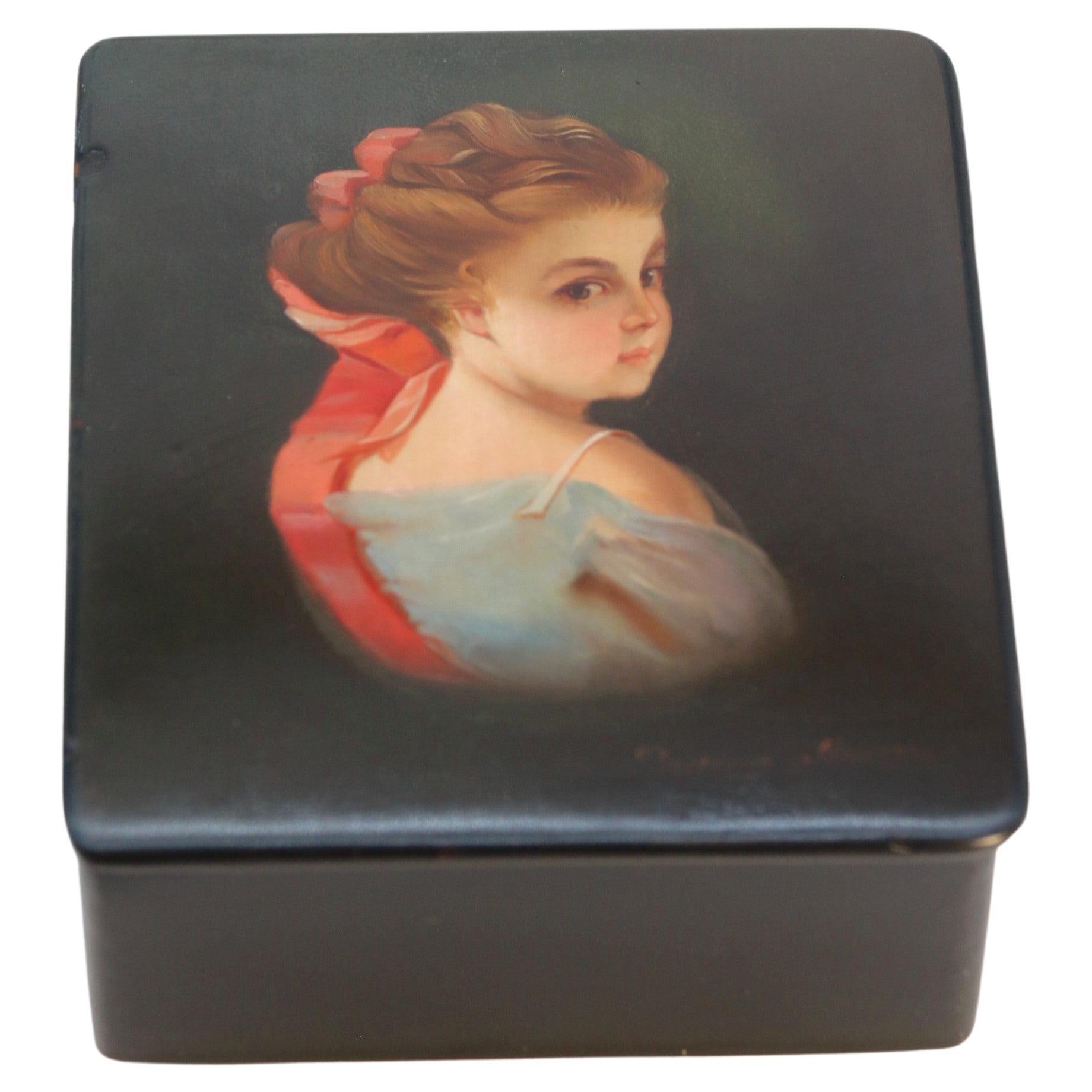 A Russian lacquered box with a portrait of a beautiful young woman circa 1920 For Sale