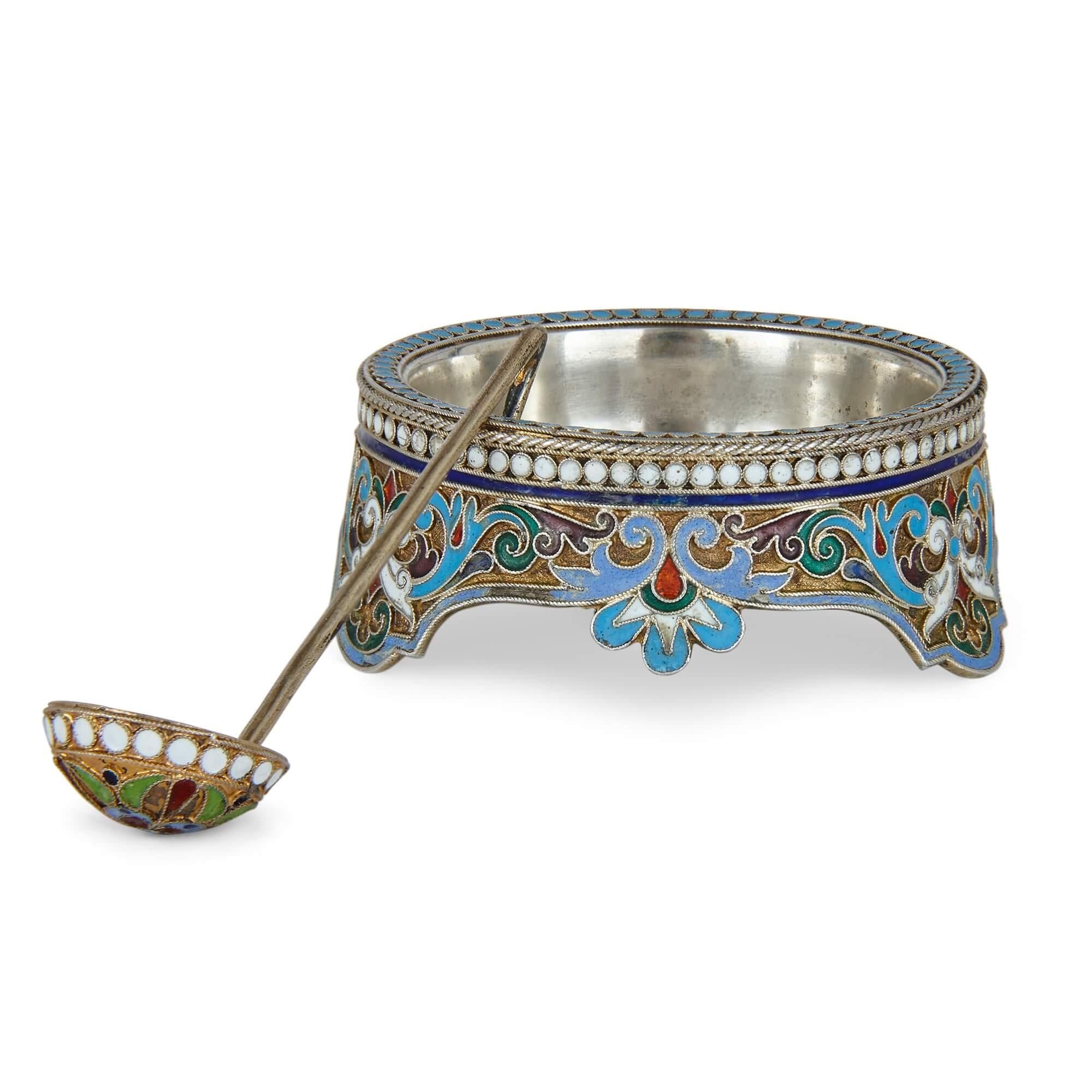A Russian silver-gilt and cloisonné enamel open salt and spoon
Moscow, Late 19th Century
2cm high x 5.5cm diameter

Beautifully ornate and superbly executed this charming and elegant salt and spoon was made in Moscow towards the end of the