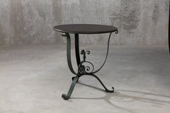 A French Art Deco style Green Patinated Wrought Iron Table (1920s-1930s)