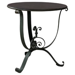 A French Art Deco style Green Patinated Wrought Iron Table (1920s-1930s)