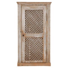 Armario rústico de una puerta de pino pintado, principios del S. XIX.