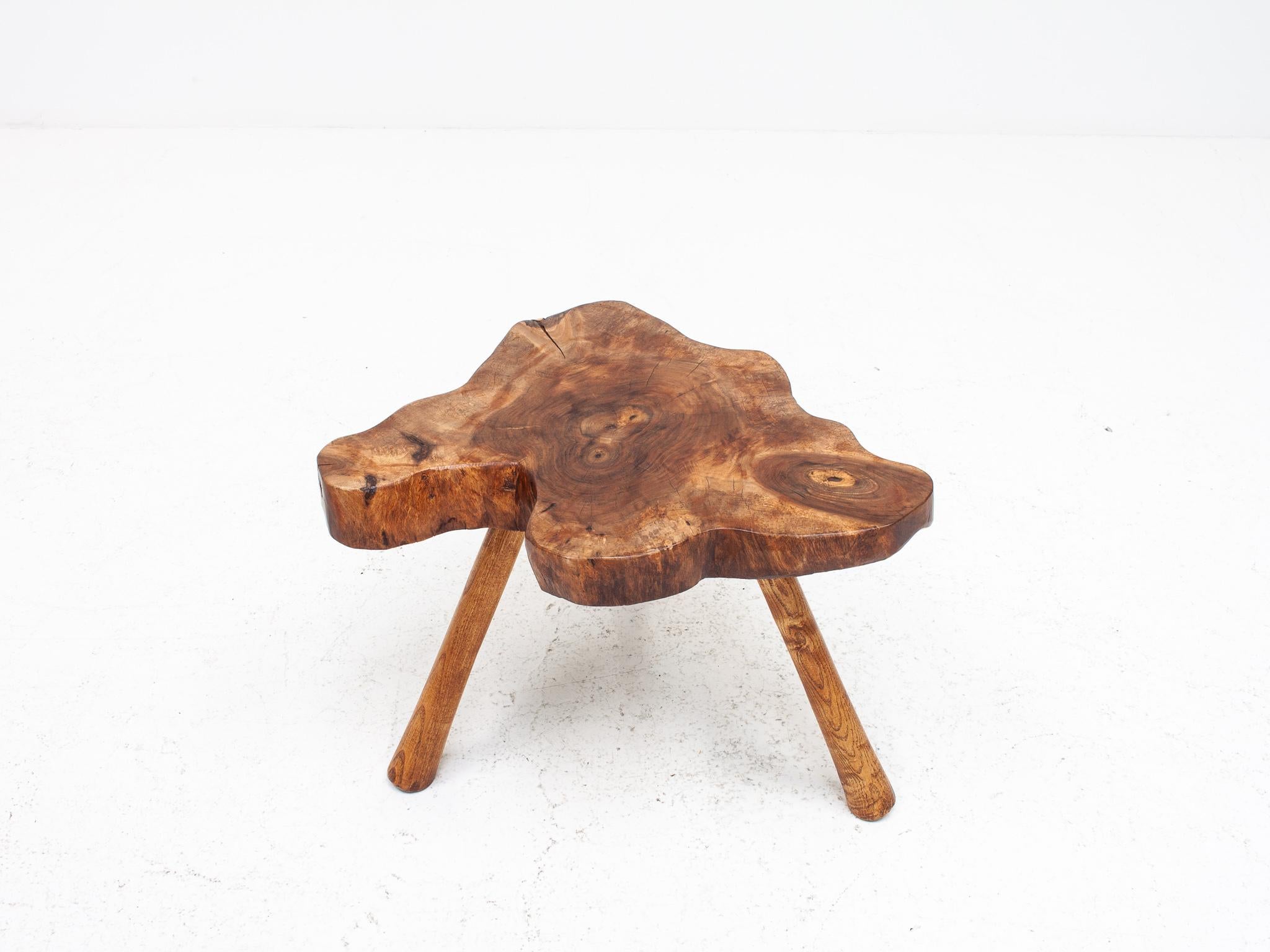 A very attractive 1960s rustic, Wabi-Sabi, vintage wriggle stool.

Condition: In good vintage condition, refinished. Being vintage do expect some light signs of age.

Dimensions:
Width: 40 cm / 15.74 inches
Depth: 34 cm / 13.38 inches
Height: